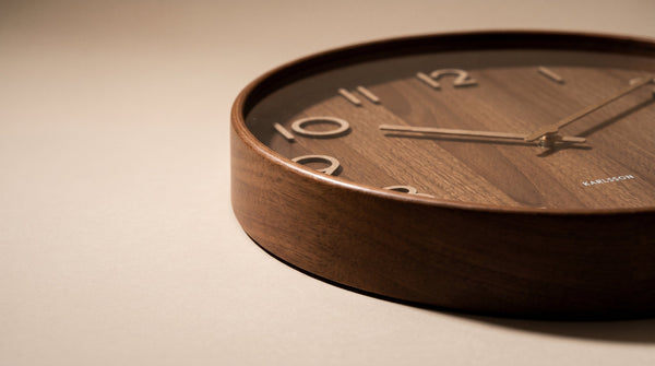 How to hang a wall clock correctly: height, spacing, and positioning