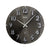 AMS wall clock with dark dial, large numbers and hands, radio clock symbol