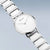 Damenuhr mit rundem weißem Zifferblatt und Keramik-Edelstahlgliederarmband