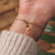 Facade Bracelet with square wooden pendant - Holzkern Model: Jewelry
