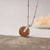 Opacity Necklace with Round Wood Pendant - Wood Core Model: Jewelry