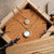 Zendala Layering Necklace Mother-of-Pearl/Gold - Wood Core Model: Jewelry