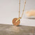 Opacity Necklace with Round Wood Pendant - Wood Core Model: Jewelry
