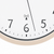 Dial detail: black numbers, black hands, and radio symbol
