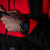 alt
Black and white close-up of a woman's wrist wearing a black watch with a black strap.