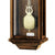 Wanduhr mit nussbaumfarbenem Holzgehäuse, rundem Pendel und Glasfront