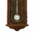 AMS Wanduhr aus Nussbaumholz mit Pendelwerk und rundem Zifferblatt