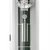 Wall clock detail: chain and metal cylinder in transparent casing