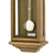 Wanduhr mit Holzgehäuse (Eiche), Pendelmechanismus und Glasfront, rundes Pendel sichtbar