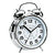 Silberner Wecker mit weißem Zifferblatt und zwei oberen Glockenbügeln