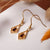 Daydreamer Earrings with Gemstone - Wood Core Model: Jewelry