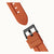 Ingersoll Armbanduhr Armband in Orange mit Dornschließe und schwarzen Elementen.