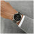 BOSS Herren-Armbanduhr am Handgelenk mit schwarzem Zifferblatt und Chronograph-Optik