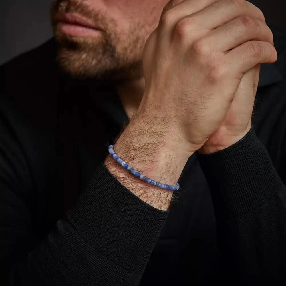 Bracelet made of disc-shaped gemstones in shades of blue with stainless steel clasp - Rebel&Rose Model: RR-40080-S-M