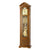 Walnut grandfather clock with glass insert, pendulum fields, and gold pendulum rods
