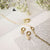 ANIA HAIE E043-04G Creole earrings with oval pearl pendant and zirconia stone