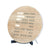 Round LED word display clock in wood look with illuminated text on stand