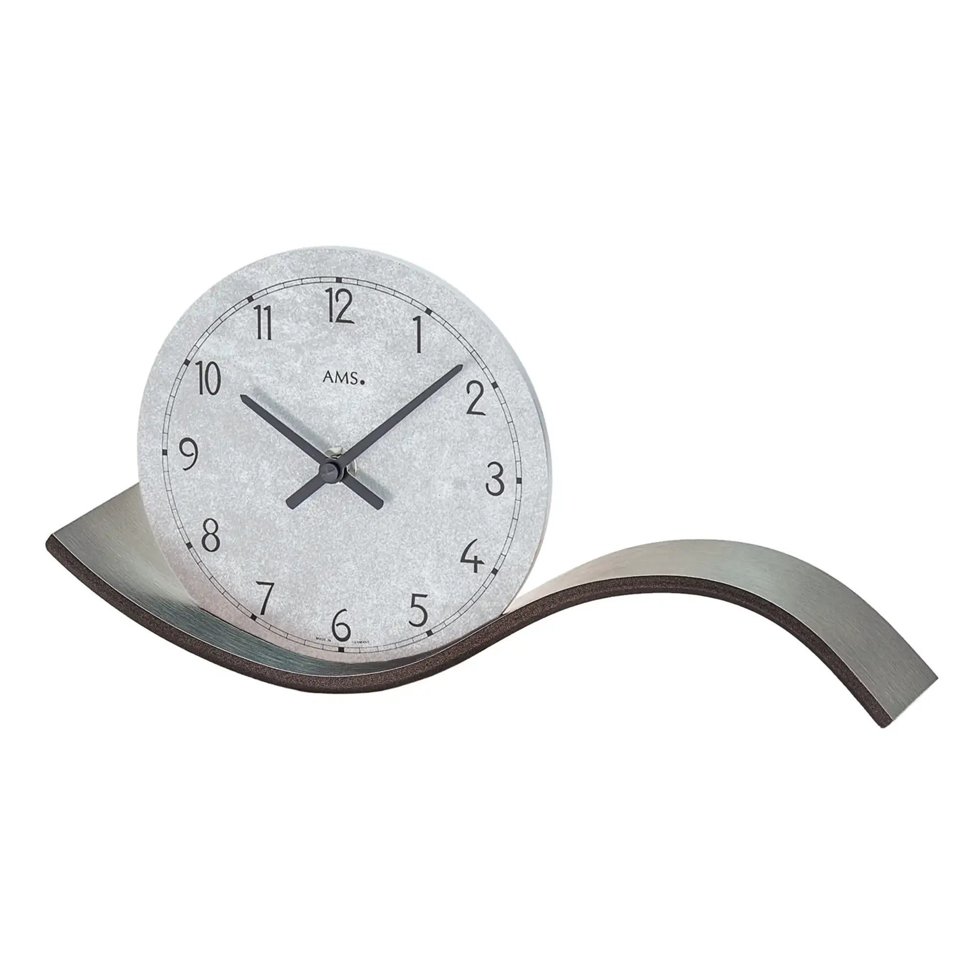 Table clock with light dial, black hands, and curved anthracite base