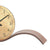 Walnut wood base of the table clock with dial cutout and numbers.