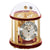 Table clock with gold-colored metal casing and round dial under glass dome