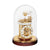 Table clock with golden movement under glass dome, round base in dark brown