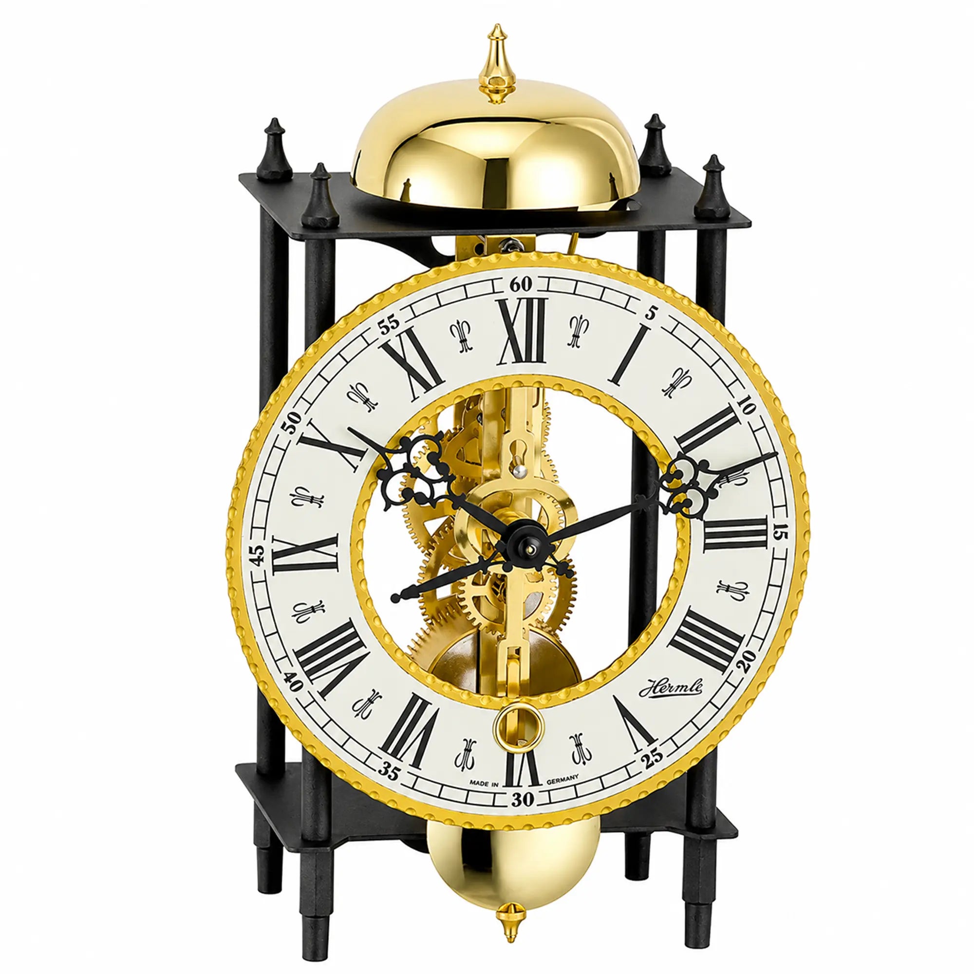 Mechanical table clock with skeleton movement, gold numerals, and black frame