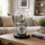 Table clock with glass dome and black base, silver movement with Roman numerals