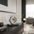 Table clock in glass cube on shelf, round dial with Roman numerals and black hands