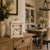 White mantel clock on solid wood dresser with floral dial