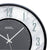 Clock face area with AMS logo, black hands, and green hour markers on marble