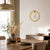 Brass wall clock with 3D dial and gold numbers