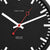 Wall clock dial in detail: black background, red hands, white line markers.