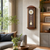 Wall clock in walnut casing with pendulum and easy-to-read dial