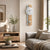 Pendulum wall clock in Sonoma oak, round white dial, and gray side panel
