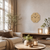 Wall clock: octagonal wooden case, beige dial with black numerals and hands.