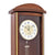 Walnut cased pendulum wall clock: Close-up of dial with pendulum movement