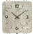 Wall clock face in gray concrete look with black hands and numbers 3, 6, 9, 12