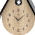 Cuckoo clock wall clock: Close-up of numbers 4–12, hands, and cuckoo window at the top
