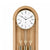 Grandfather clock dial in wooden case with hands and marked hours