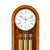 Wooden grandfather clock: Close-up of dial and chime rods with three round suspensions