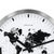 Close-up of wall clock: silver frame, white dial with black world map