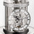 Table clock with glass dome, delicate metal movement, and Roman numerals