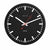 Wall clock: black dial, red hands, white line markers, round black frame.