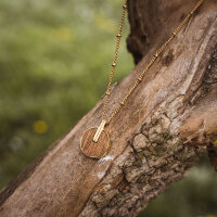 Opacity necklace with a round wooden pendant - Holzkern Model: Jewelry