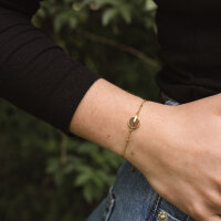 Opacity bracelet with a round wooden pendant - Holzkern Model: Jewelry