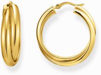 Gold-colored large hoops in an interlaced 90s-inspired...