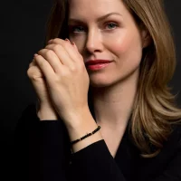 Bracelet made of black and gold-colored gemstones with...