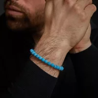 Bracelet made of 8mm Turquenite stones with stainless...