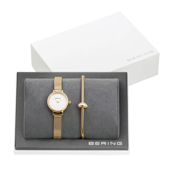Damenuhr, Saphirglas Set mit beiliegendem, goldfarbenem Armband mit goldweißem Charm - Bering Modell: 11022-334-Lovely-1-GWP170